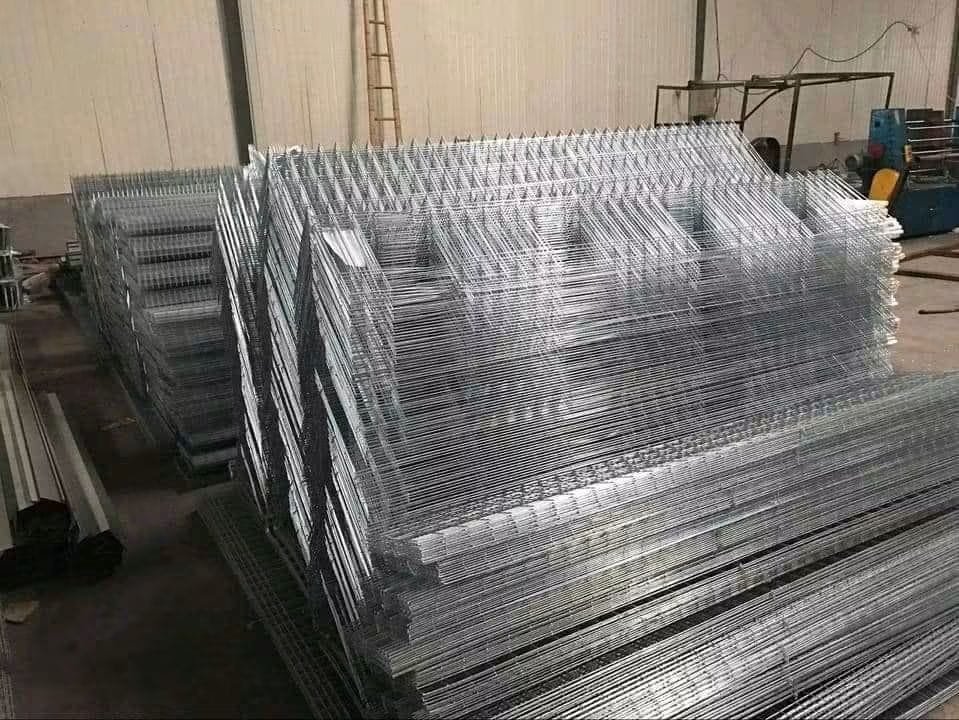 Row of compact gamefowl stag pens for grow-out housing